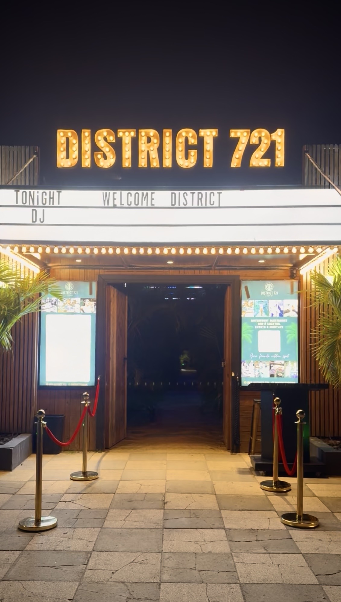 The illuminated District 721 entrance at night